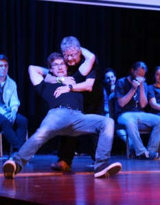 Tom Hadley supports his team mate in last year's Playmates, on the Wollongong Comedy team.